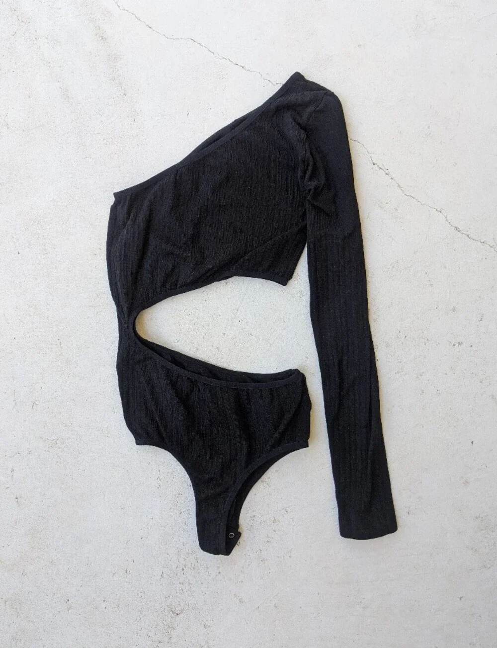 Free People black ribbed asymmetric cutout bodysuit